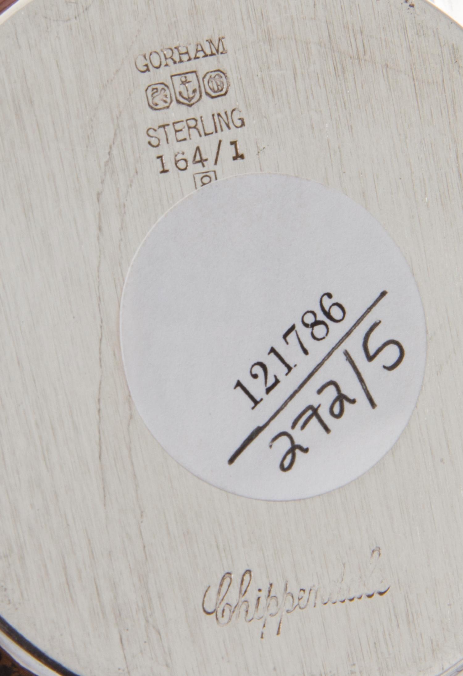 A Group of American Silver Table Articles, Various Makers, 20th Century, comprising a Gorham Mfg. Co. brandy warmer, a Quaker Silver Co