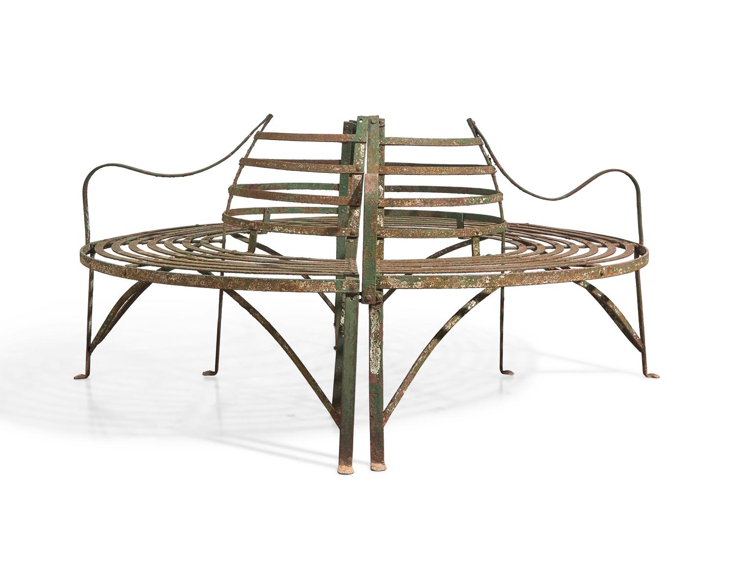 A Pair of Curved Wrought Iron Tree Benches