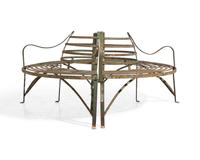A Pair of Curved Wrought Iron Tree Benches