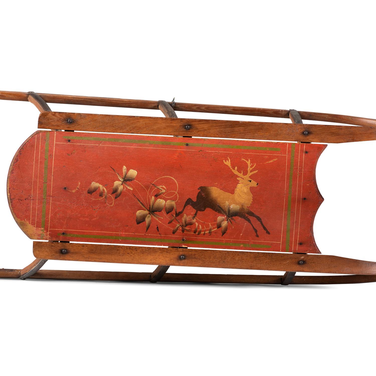 Two Paint Decorated Wood Sleds