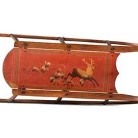 Two Paint Decorated Wood Sleds
