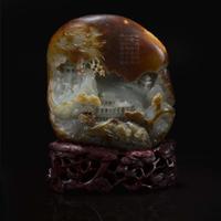 A Chinese russet and pale celadon jade "Mountain" boulder 玉雕山子及底座 Jade late Qing or earlier ????????