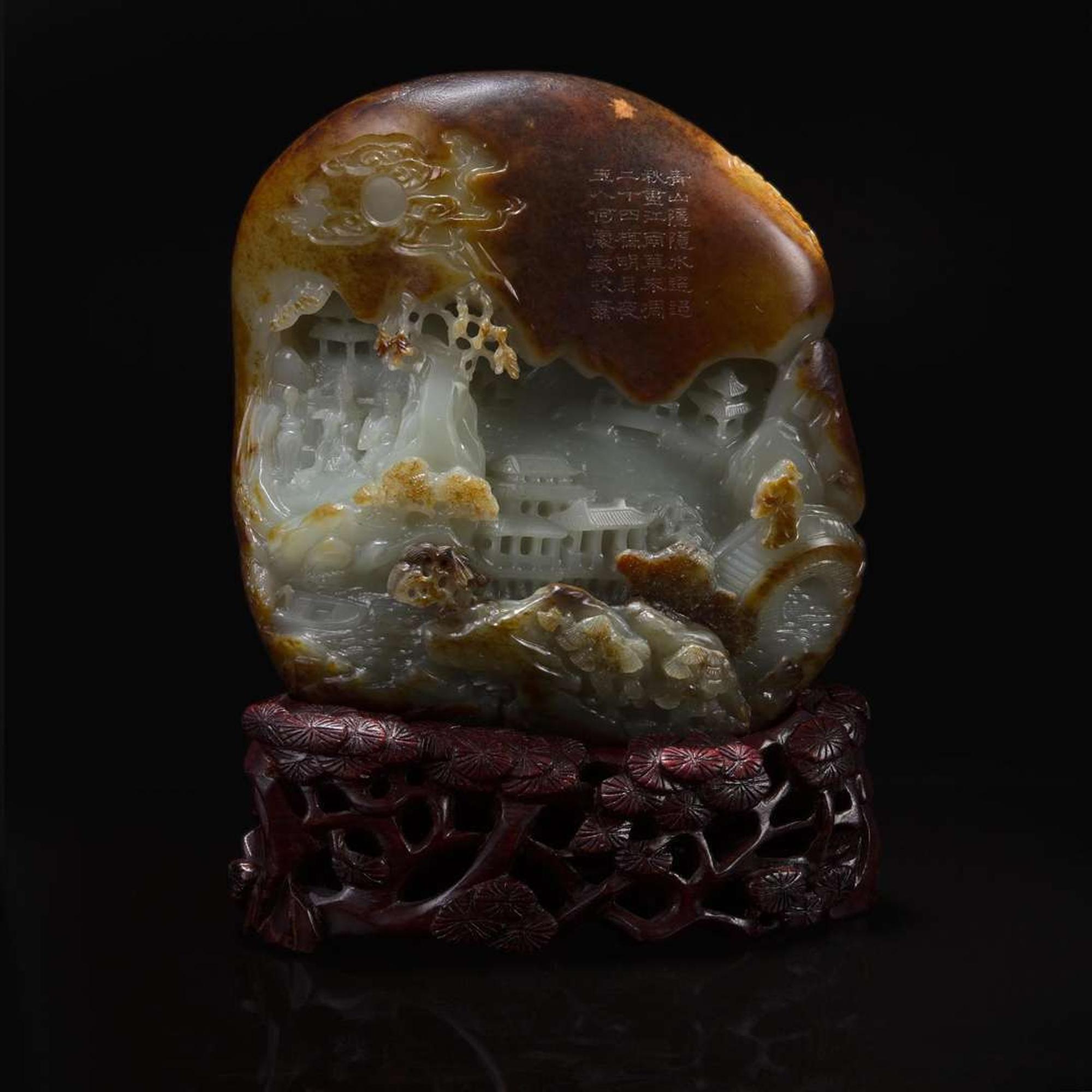 A Chinese russet and pale celadon jade "Mountain" boulder 玉雕山子及底座 Jade late Qing or earlier ????????