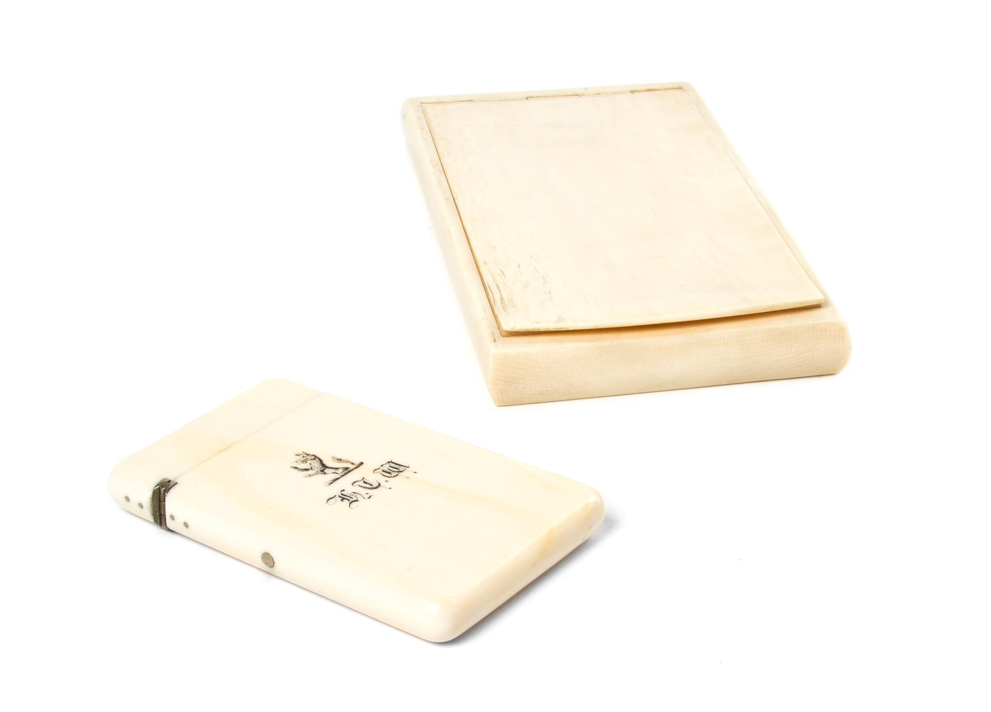 Two Ivory Cases, Width of first 6 inches.