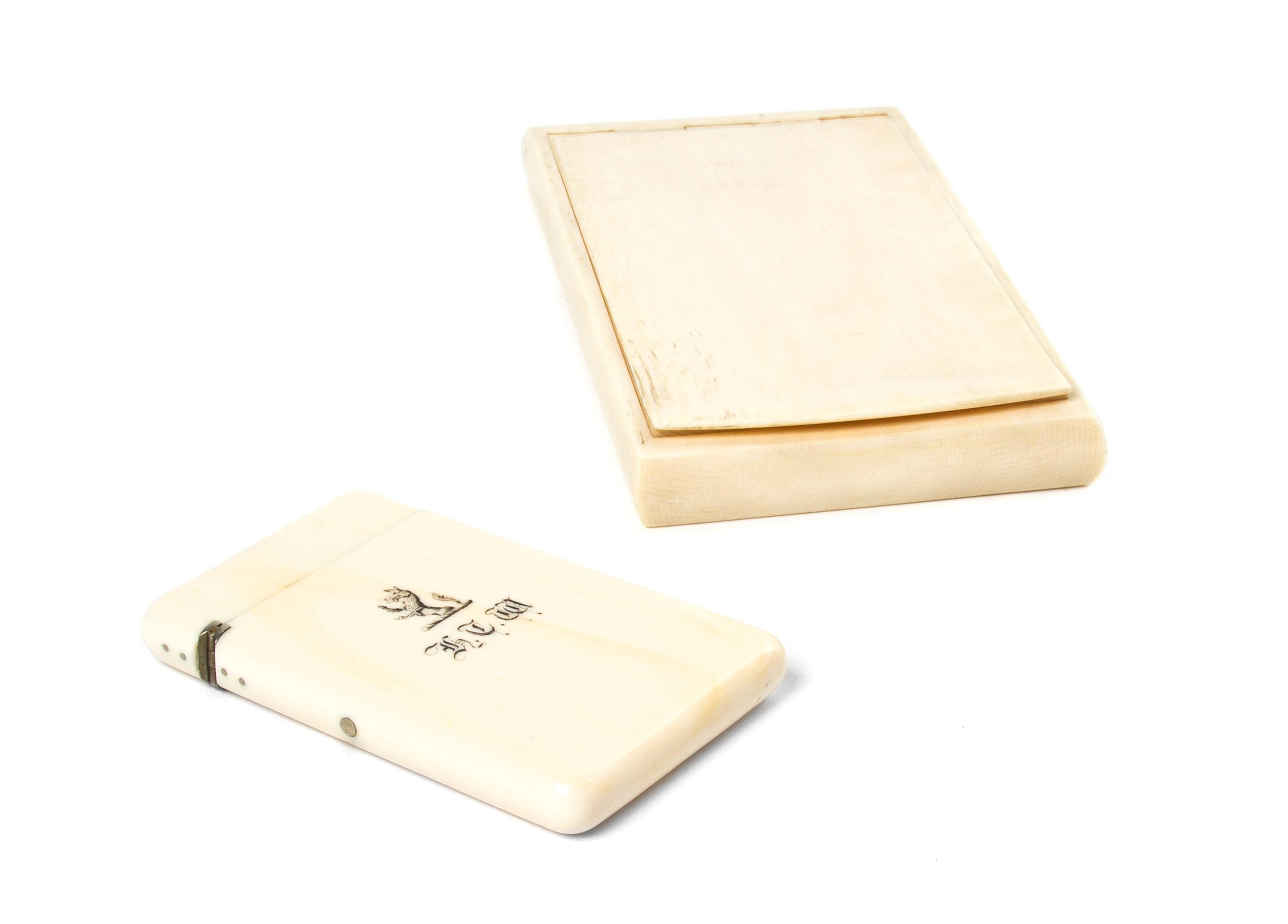 Two Ivory Cases, Width of first 6 inches.