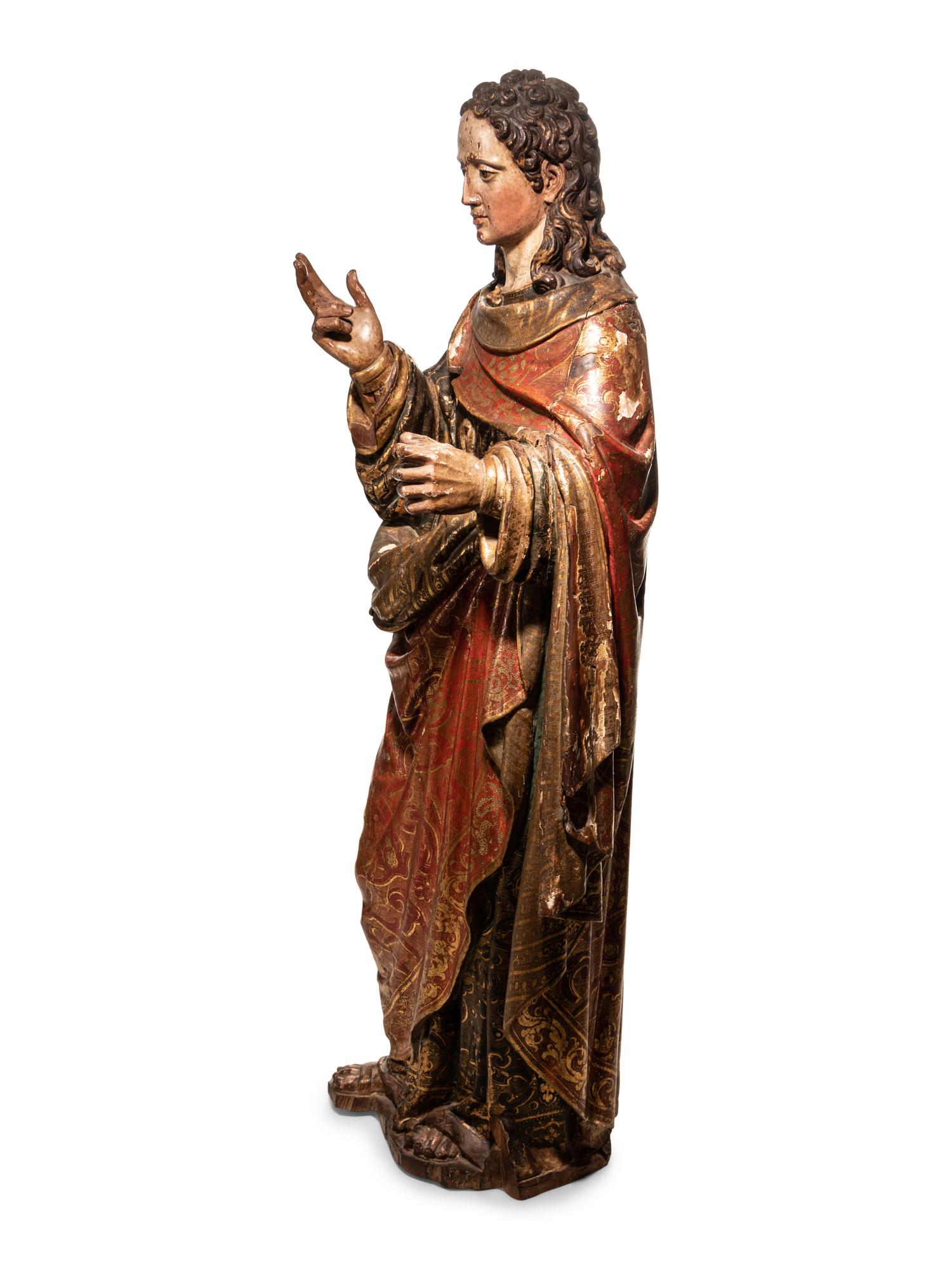 A Carved Parcel Gilt and Polychrome Decorated Figure of Santa Luzia