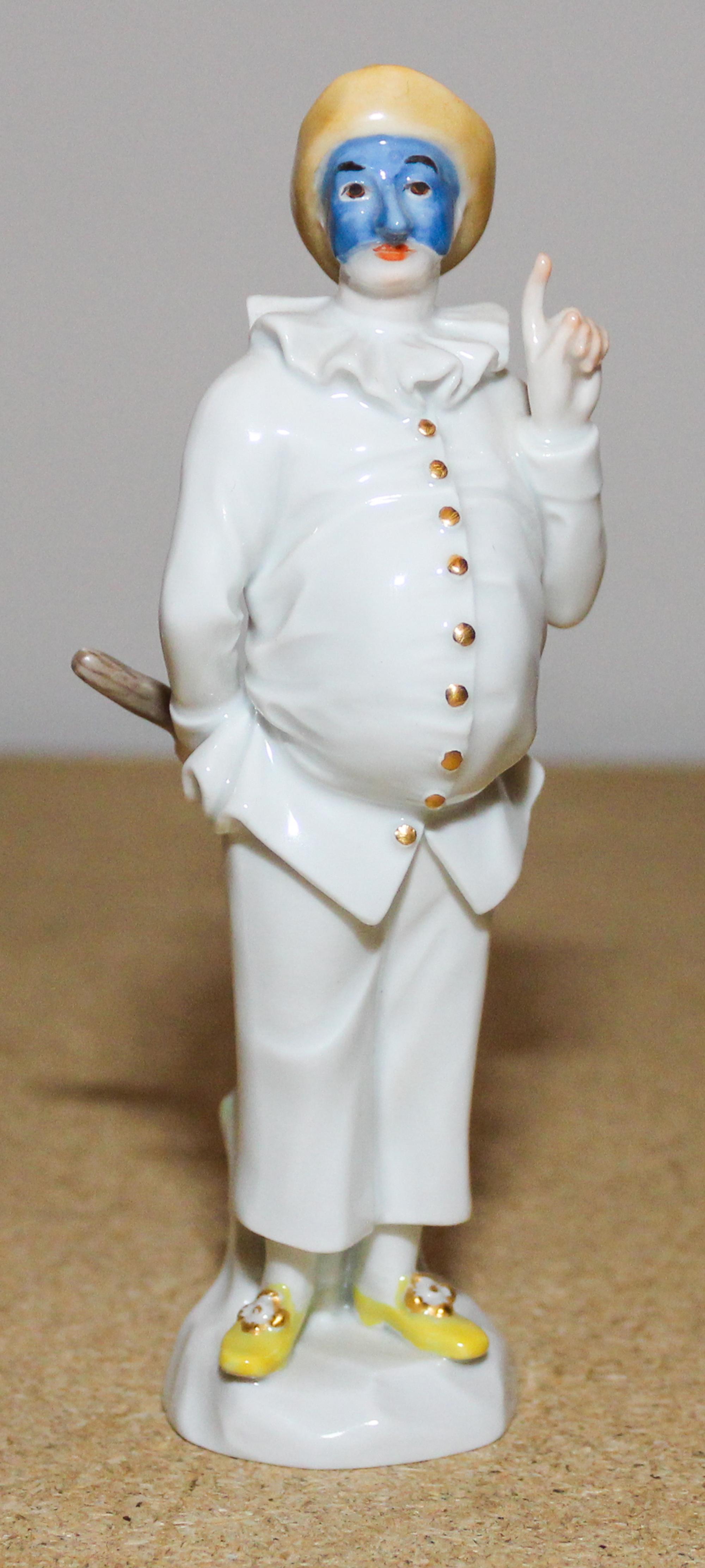 A Meissen Porcelain Figure Height 5 1/2 inches.