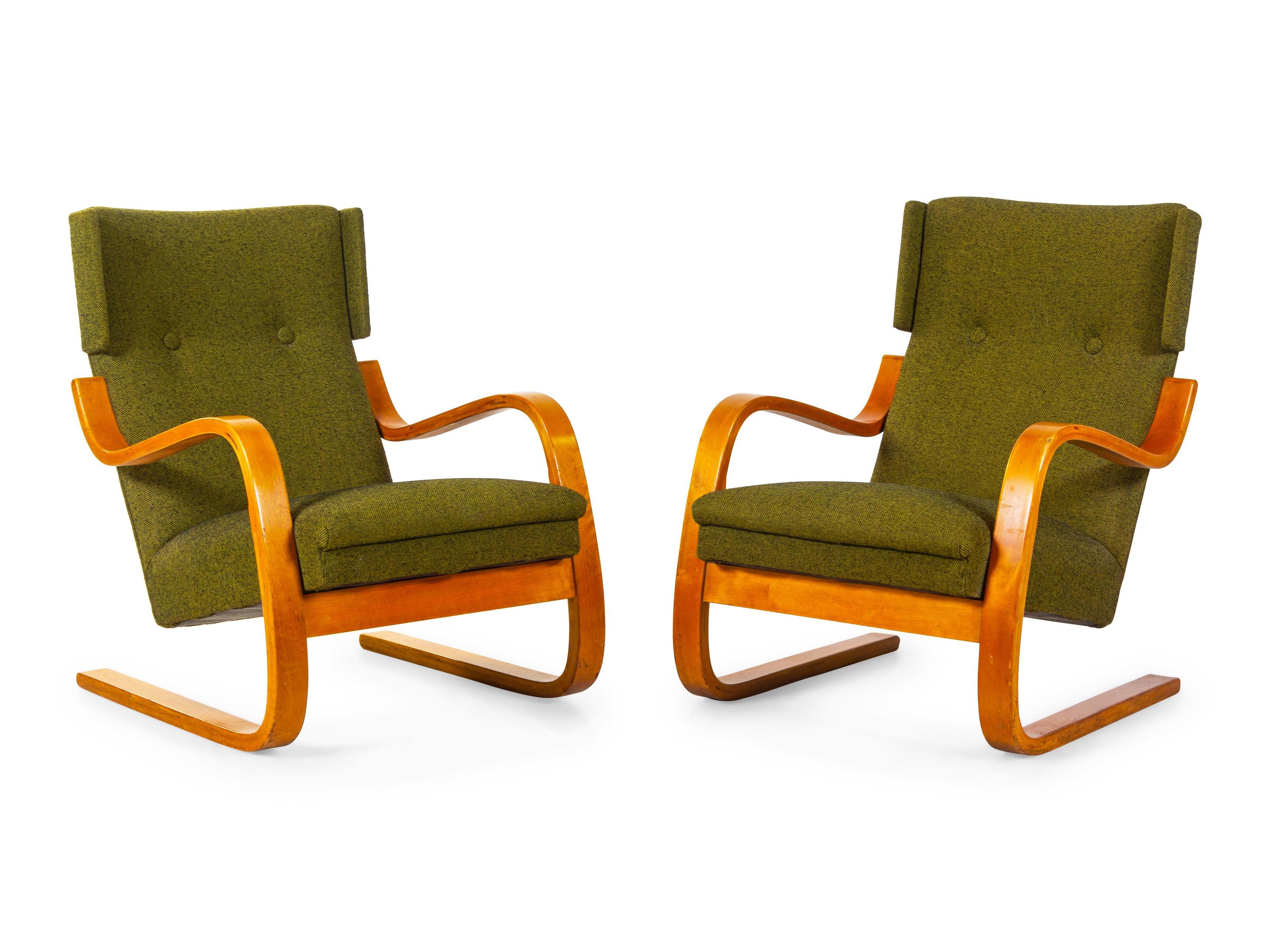 A Pair of Model 36 Lounge Chairs Finmar, Finland