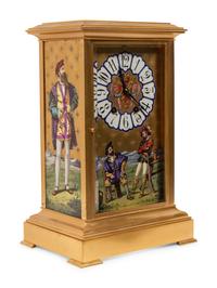 A French Porcelain Inset Gilt Metal Mantel Clock