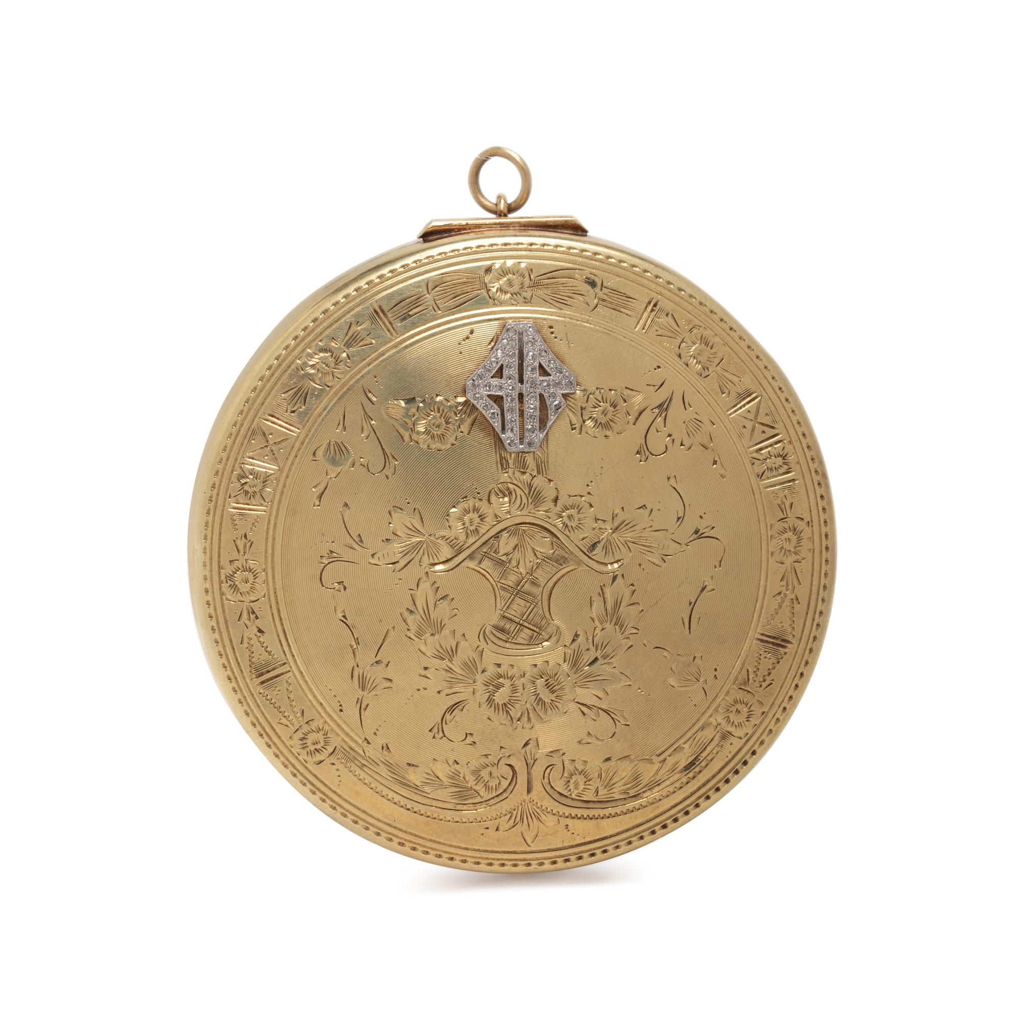 YELLOW GOLD AND DIAMOND COMPACT