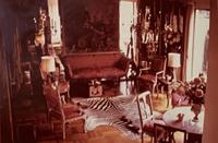 A Pair of Italian Painted and Parcel Gilt Lyre-Back Armchairs