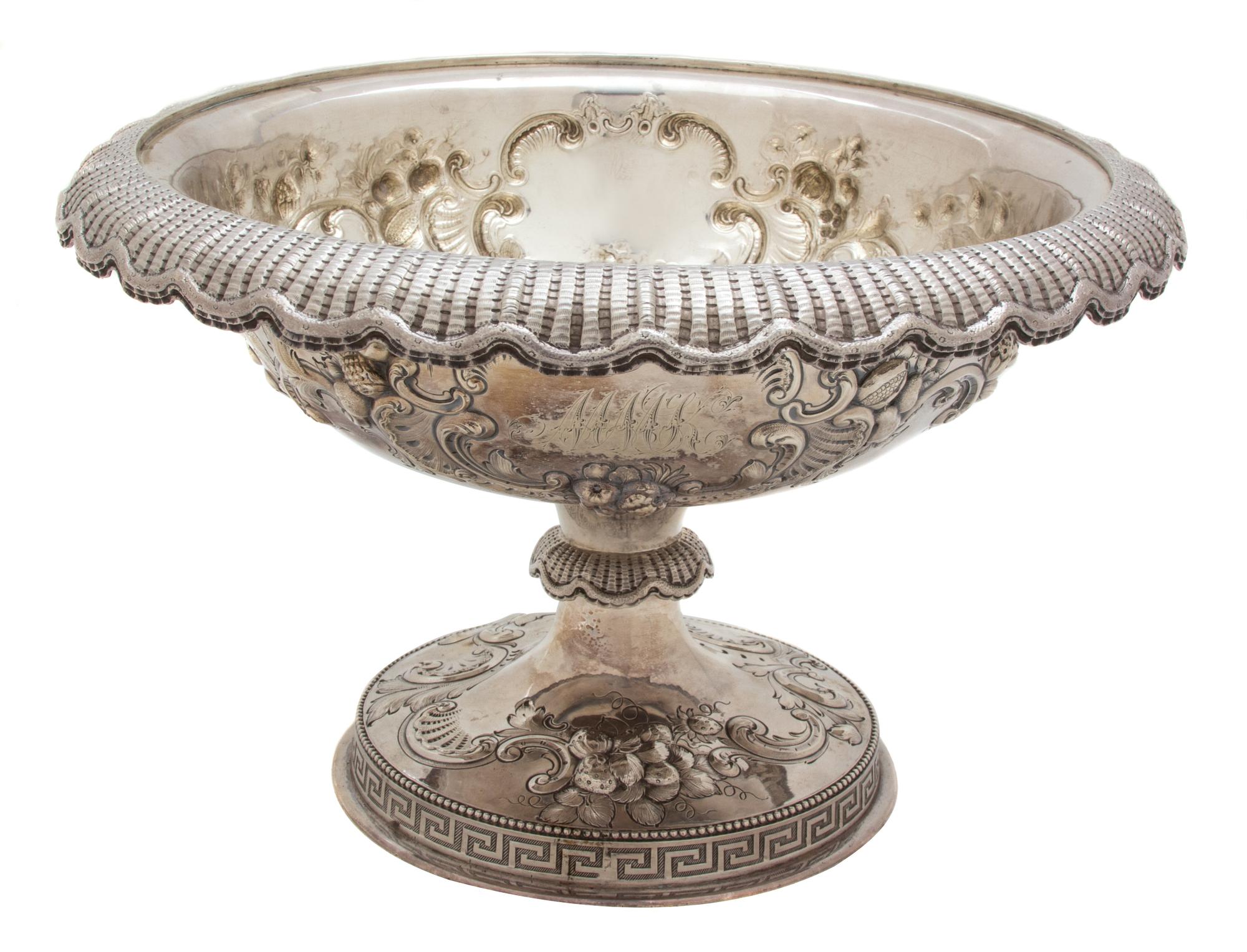 An American Silver Footed Bowl, J.E. Caldwell & Co., Philadelphia, PA, 20th Century, having an open cartouche and grapevine decoration