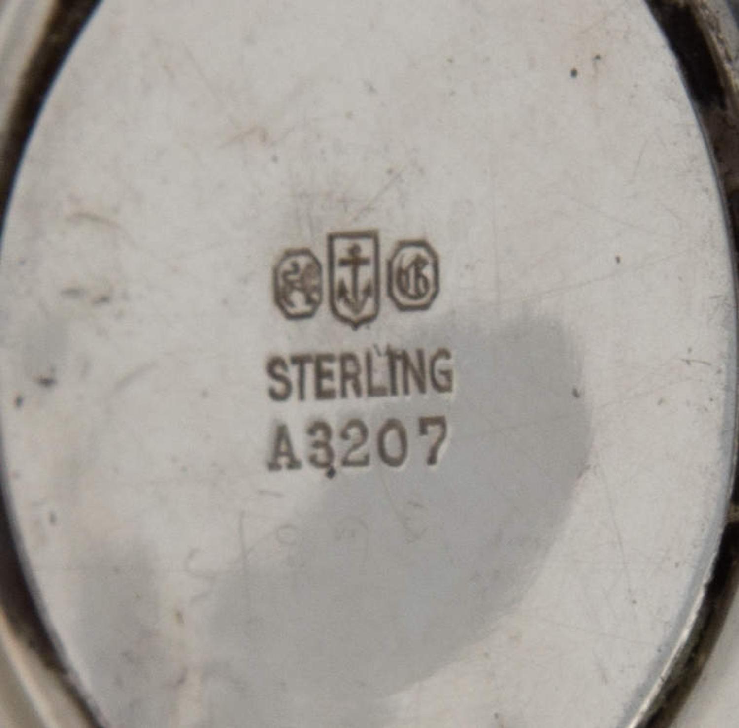 A Pair of American Silver Candlesticks