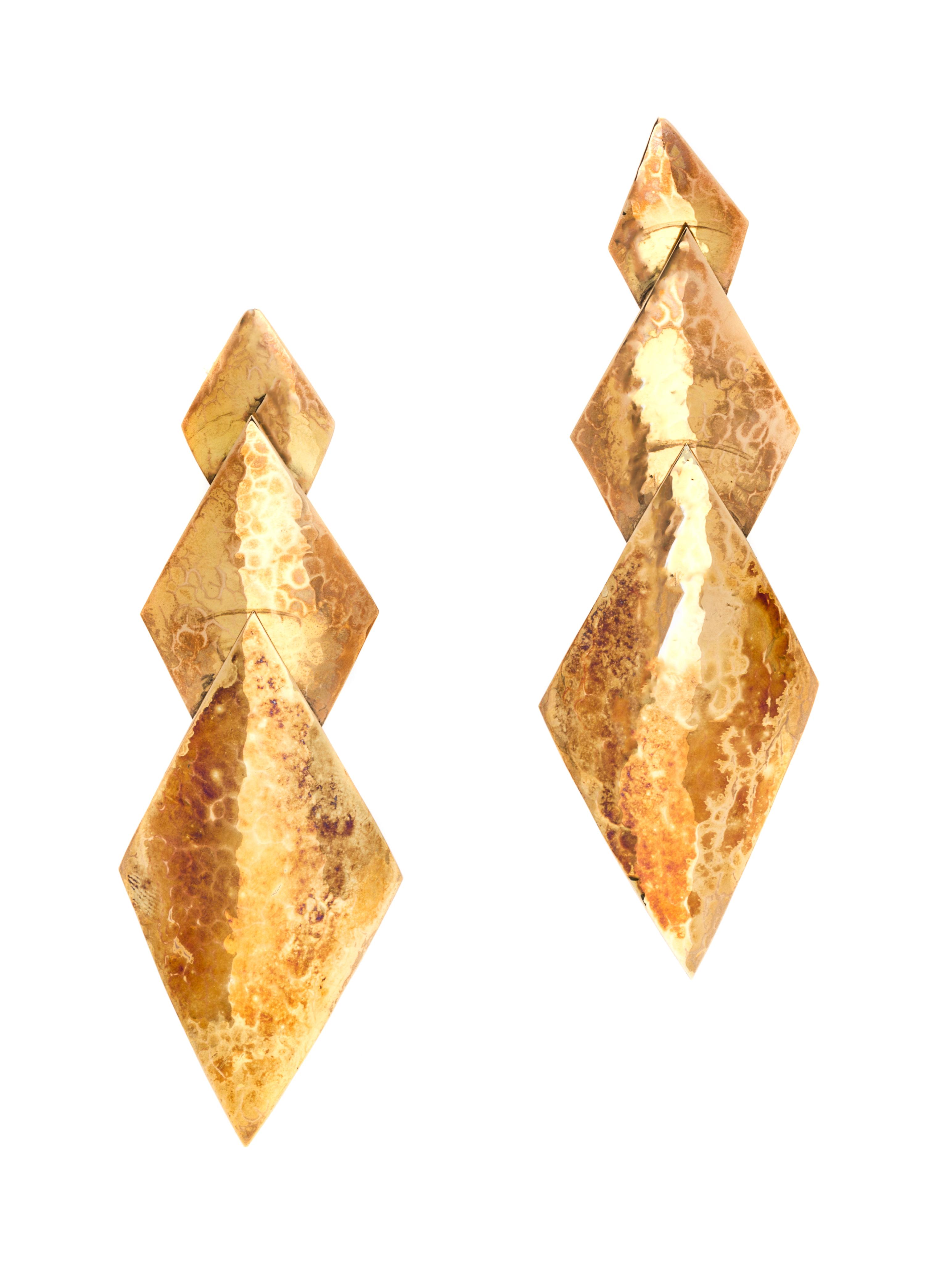 A Pair of 14 Karat Yellow Gold Earclips, 13.50 dwts.