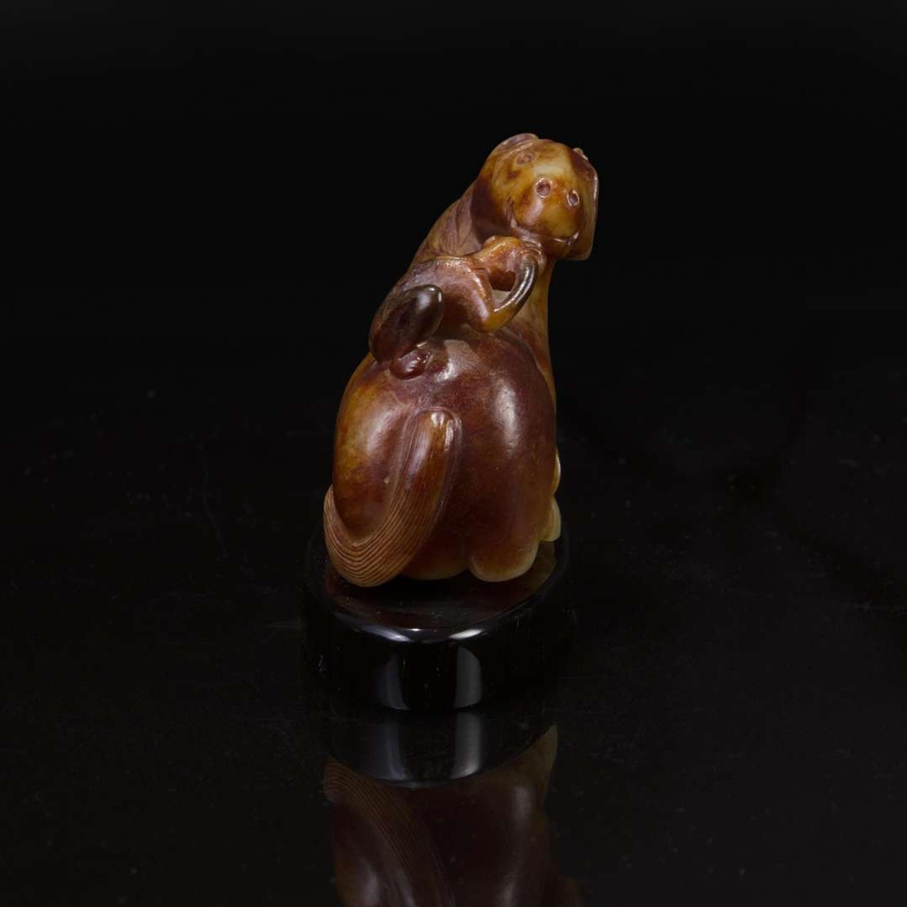 A Chinese yellowish and russet jade "Horse and Monkey" group 马上封”猴“玉雕 18th century or later ???????