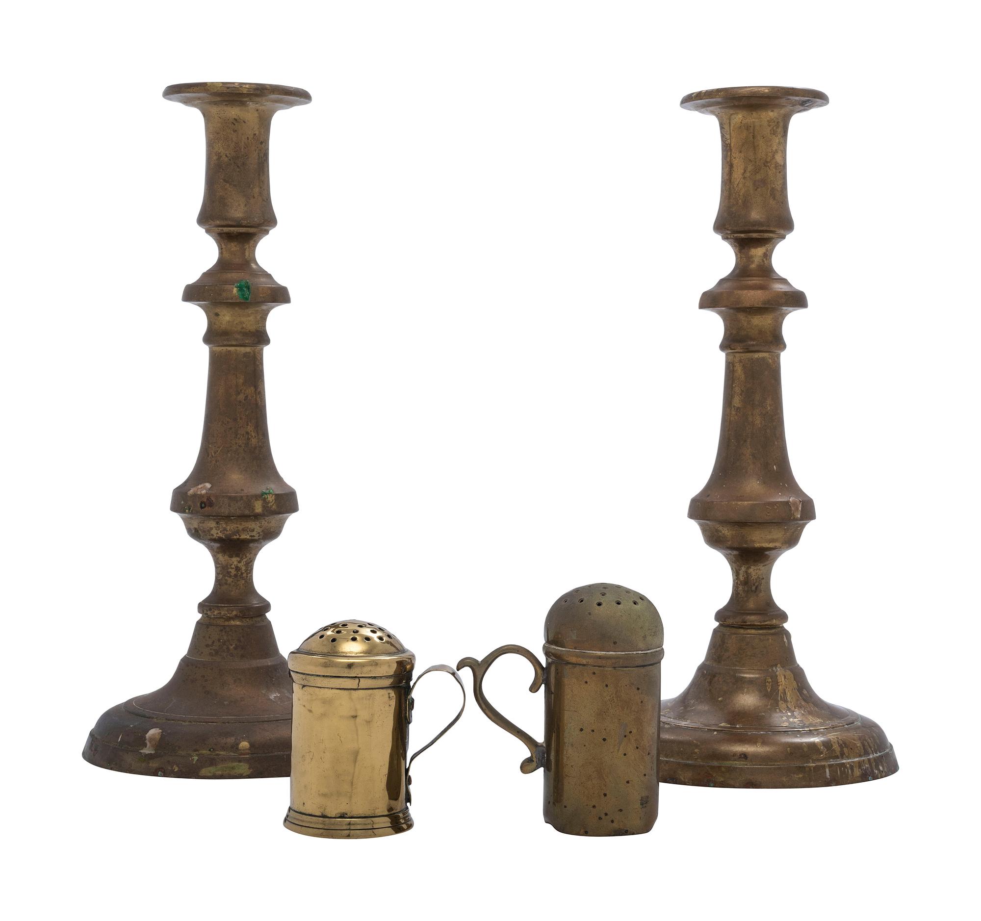 A Pair of Brass Candlesticks and Two Brass Shakers