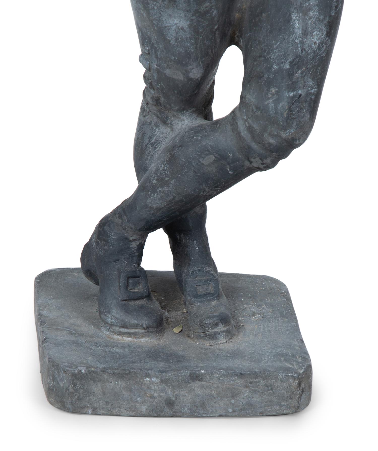 A Cast Lead Garden Figure — EARLY 20TH CENTURY
