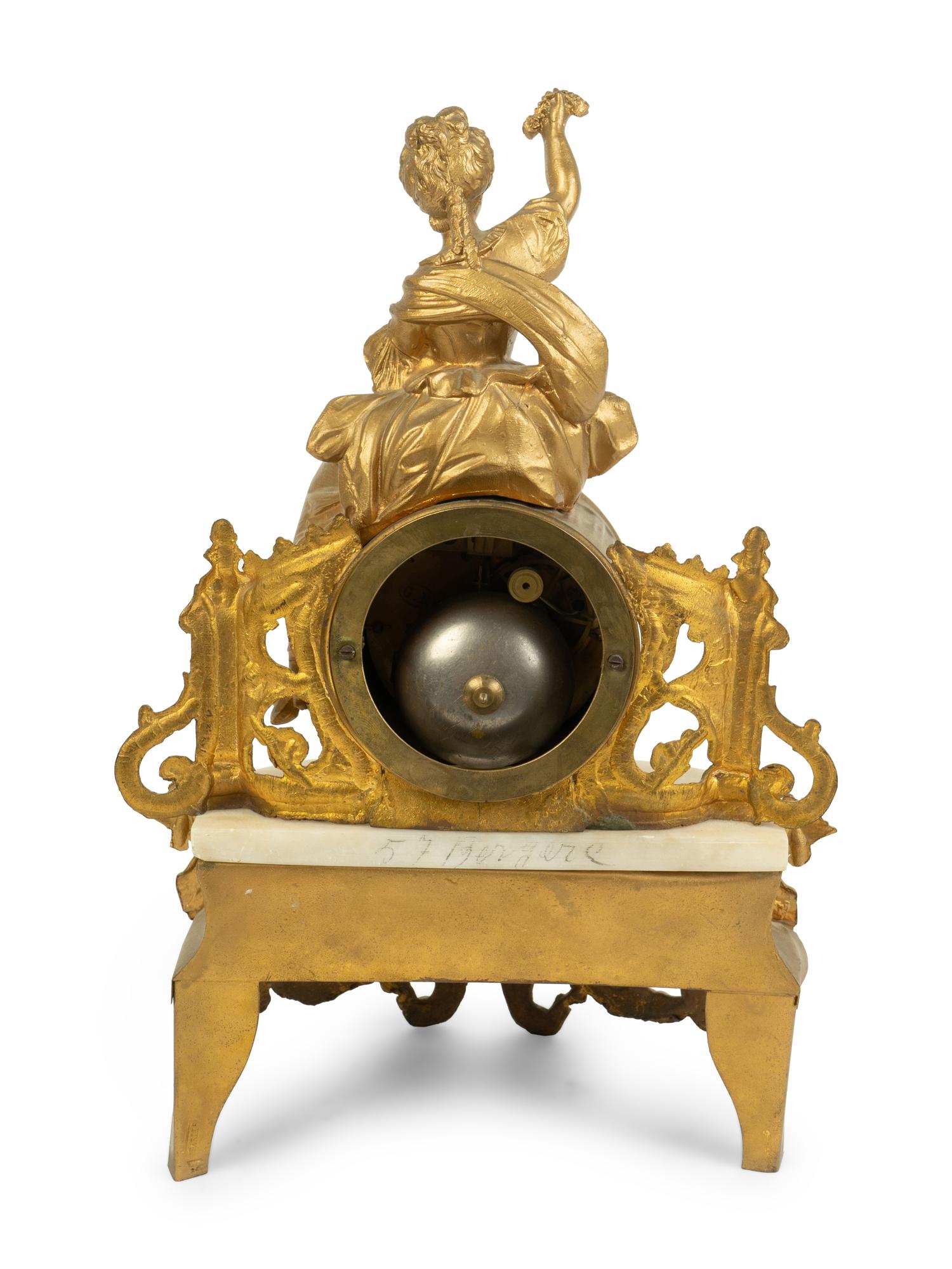 A French Gilt Metal and Alabaster Clock — LATE 19TH CENTURY