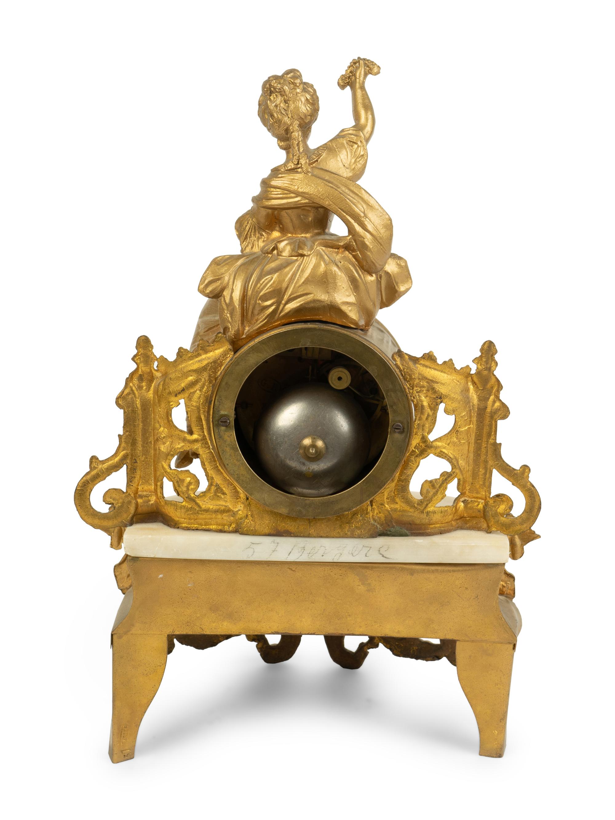 A French Gilt Metal and Alabaster Clock — LATE 19TH CENTURY