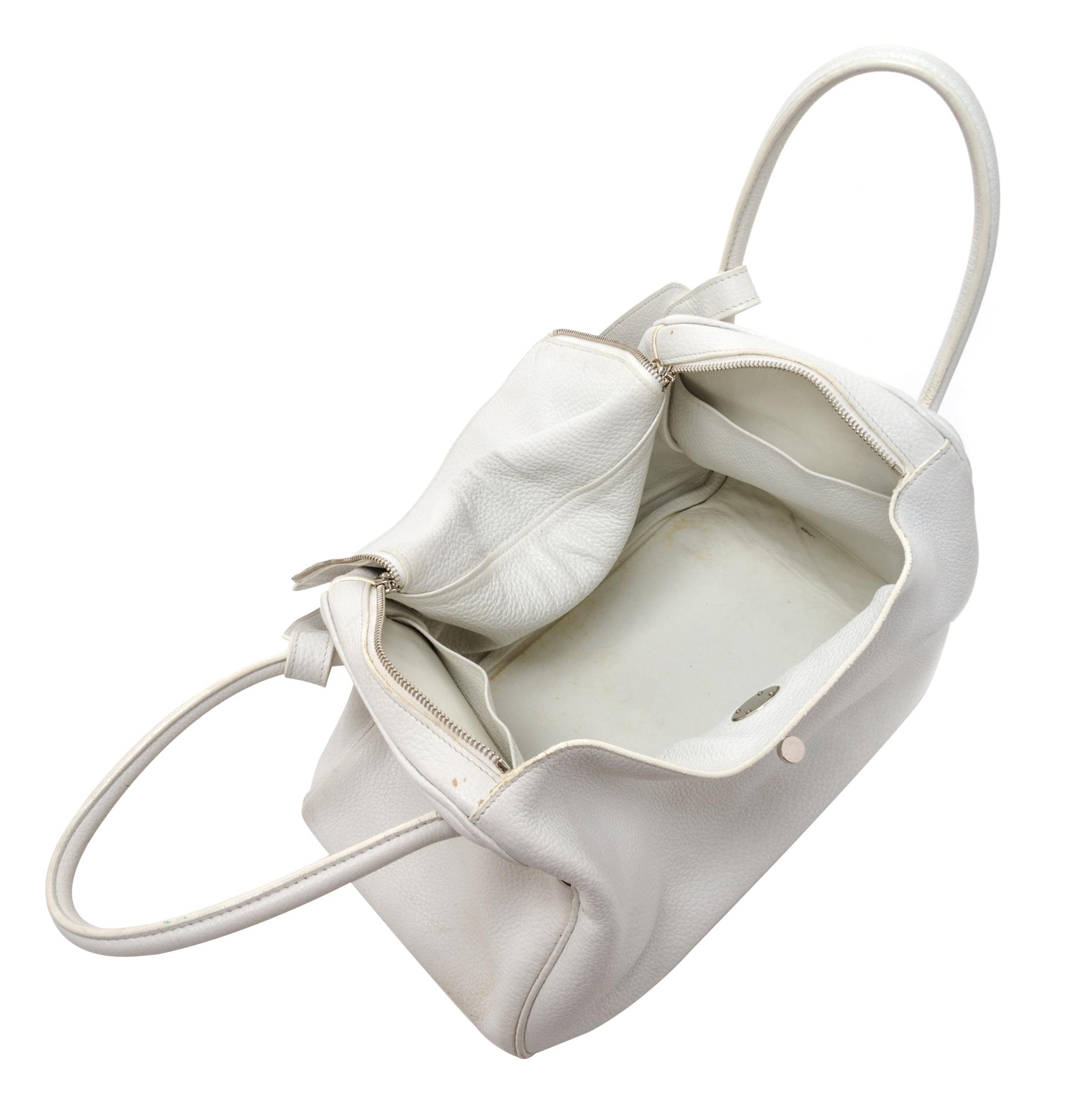 An Hermes White Taurillon Clemence Lindy 34 Handbag, 13.5" x 8" x 7".