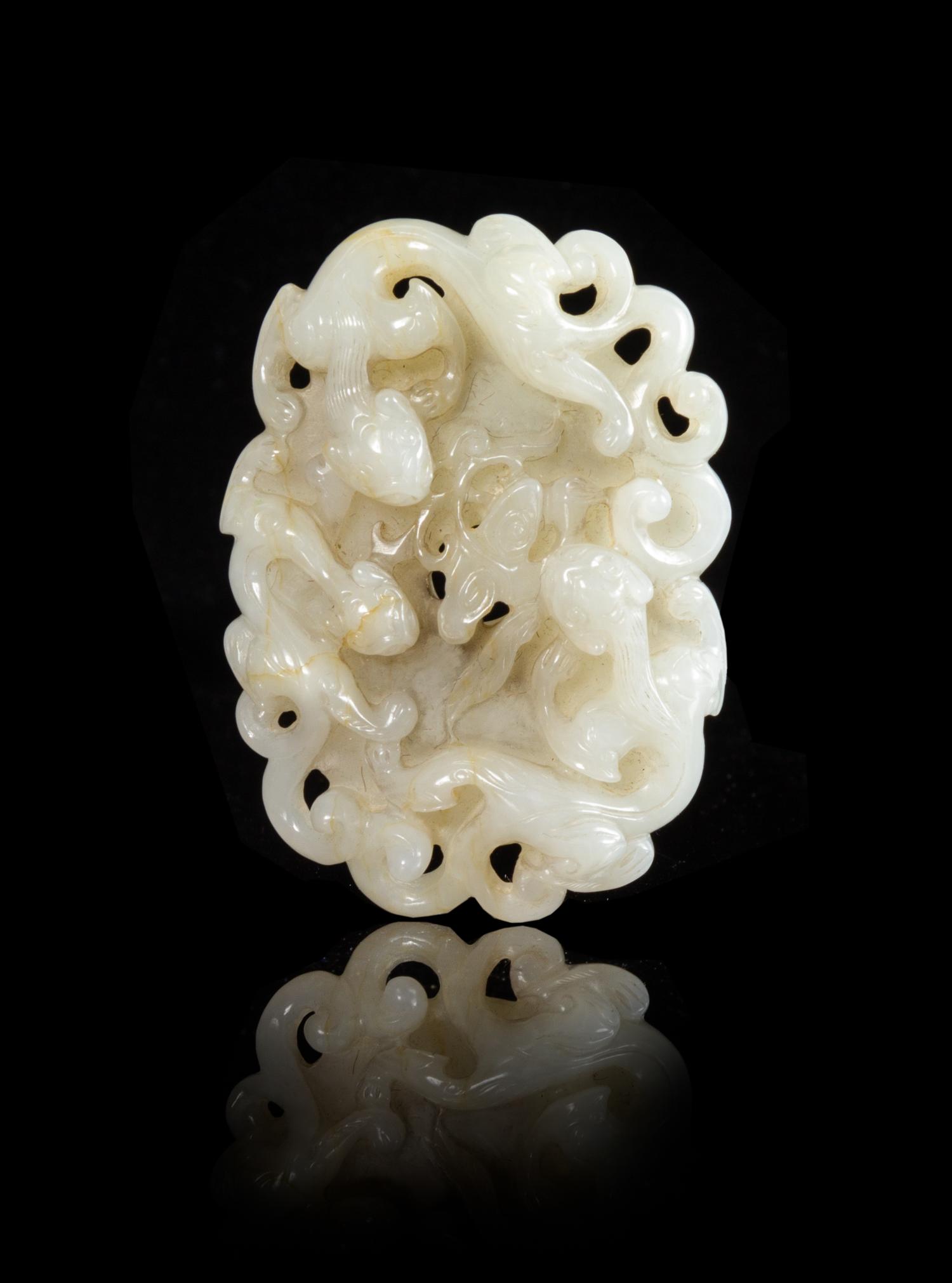 A Carved White Jade Plaque Length 2 7/8 inches.