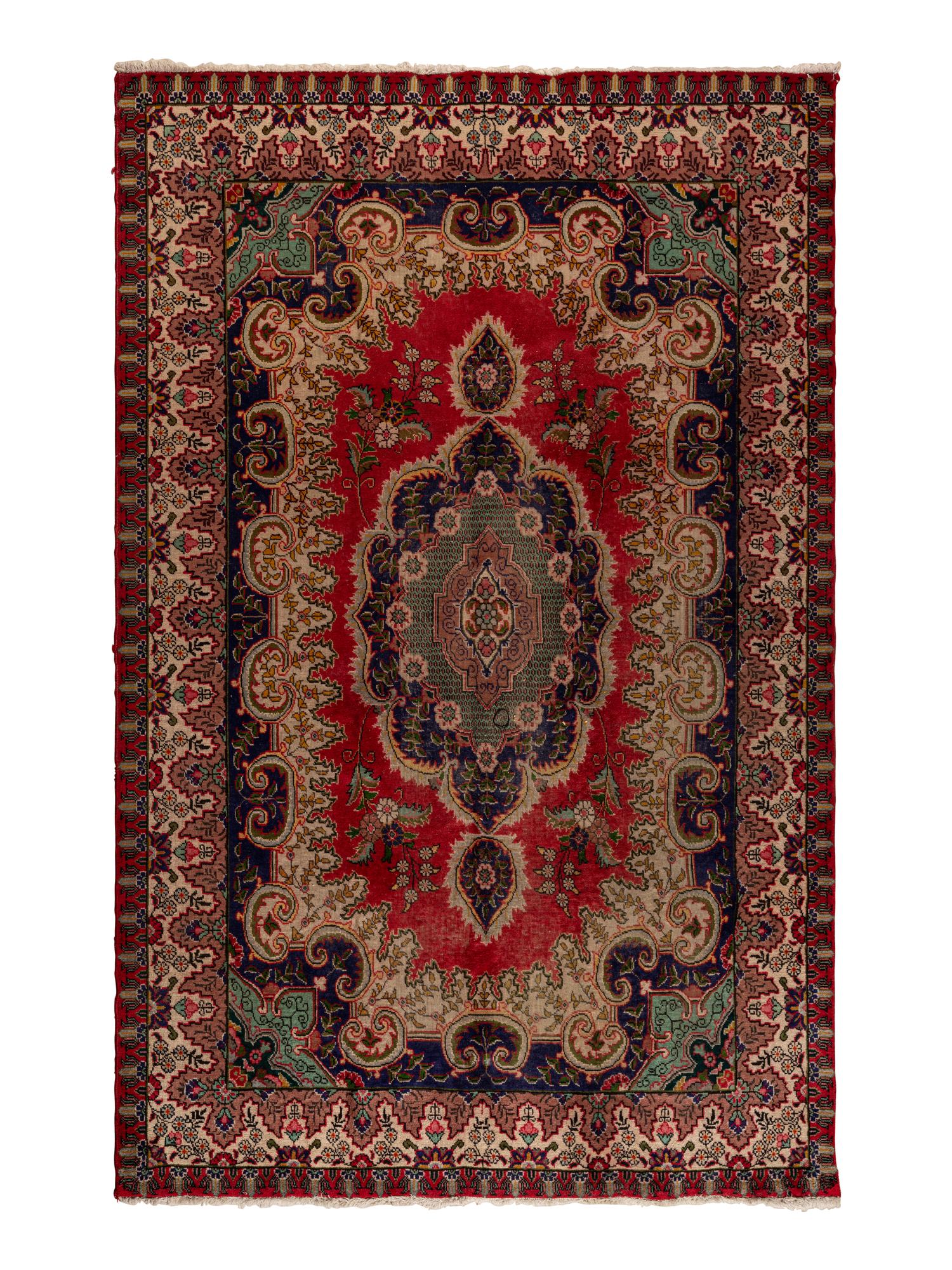 A Tabriz Wool Rug