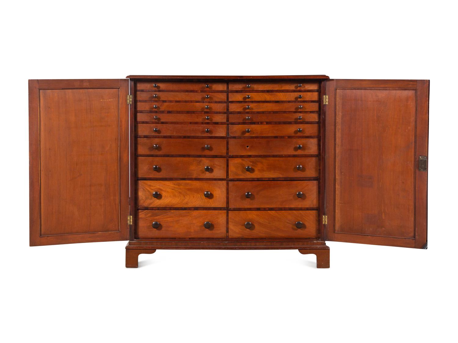 An English Mahogany Collector’s Cabinet