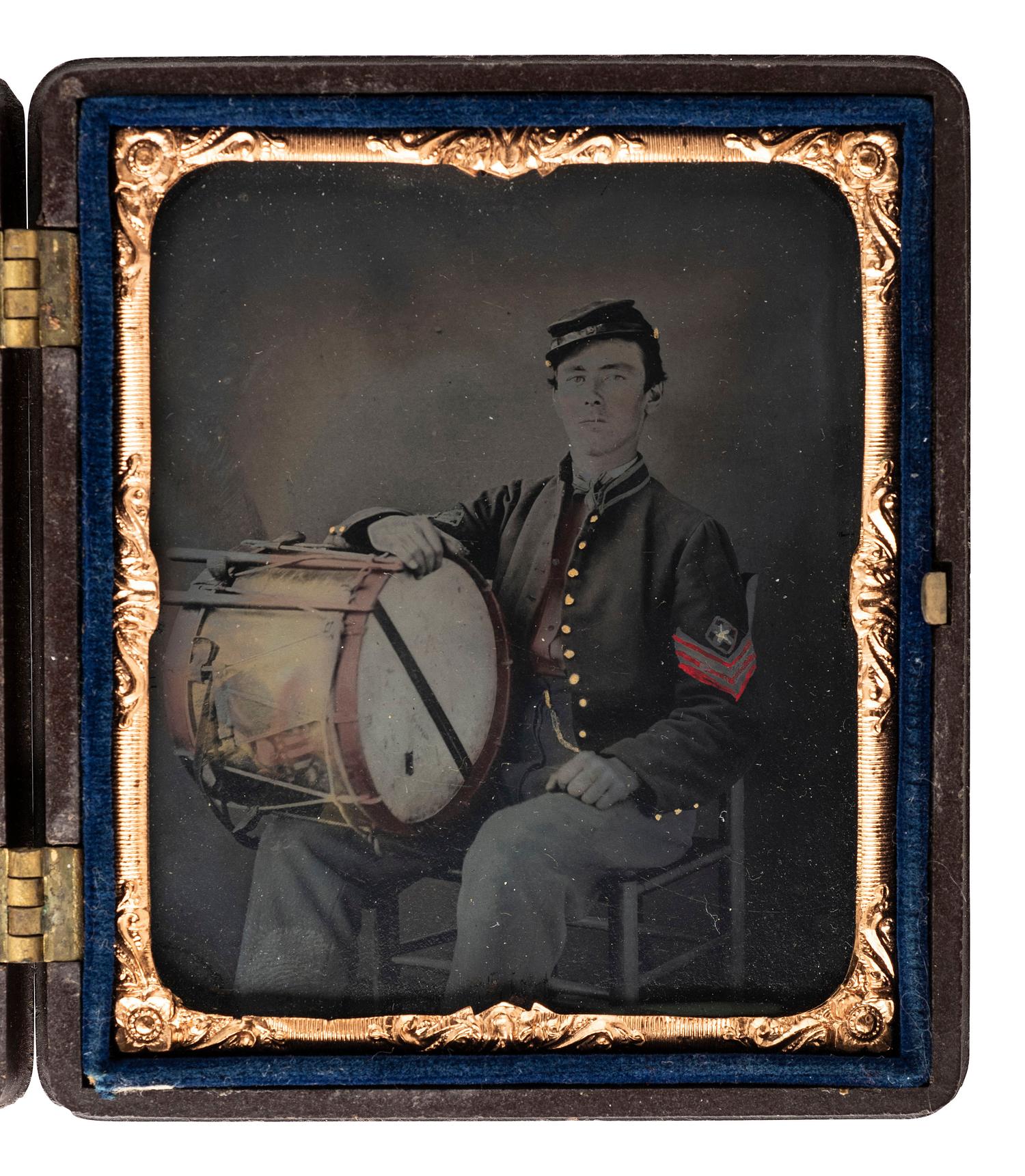 [CIVIL WAR]. Sixth plate tintype portrait of a Civil War drummer with hand tinting. [With:] sixth plate portrait of a young woman, likely his wife.