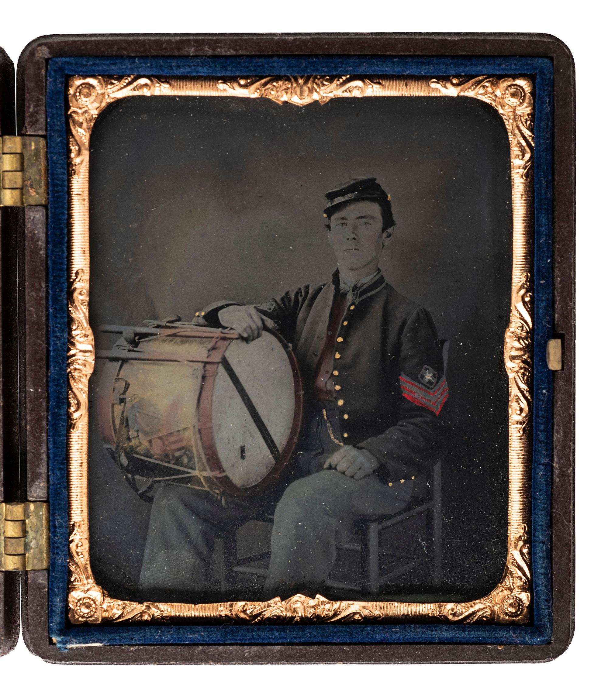 [CIVIL WAR]. Sixth plate tintype portrait of a Civil War drummer with hand tinting. [With:] sixth plate portrait of a young woman, likely his wife.