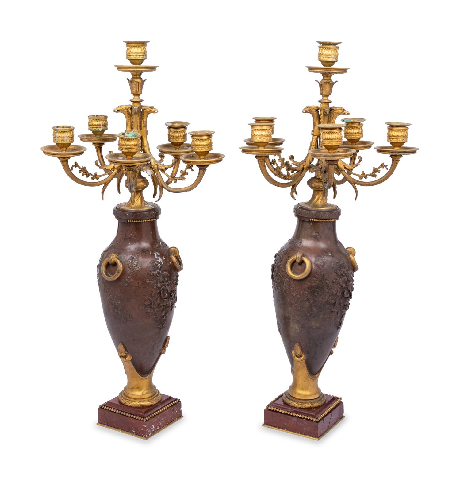 A Pair of Louis XVI Style Gilt and Patinated Bronze Six-Light Candelabra