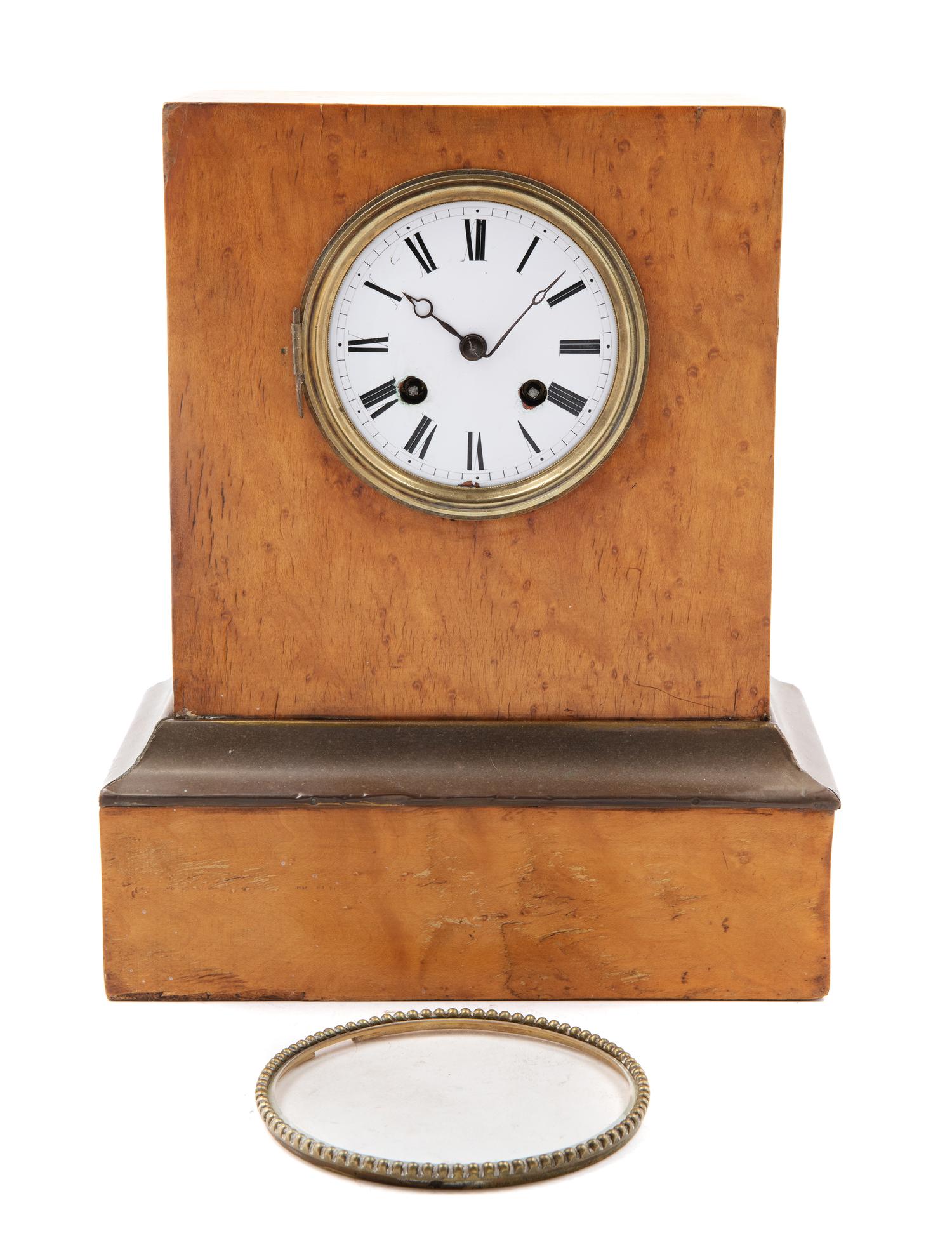 A Continental Maple and Gilt-Metal Mounted Mantel Clock