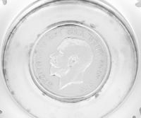 A Set of Four English Silver Coin-Inset Nut Dishes