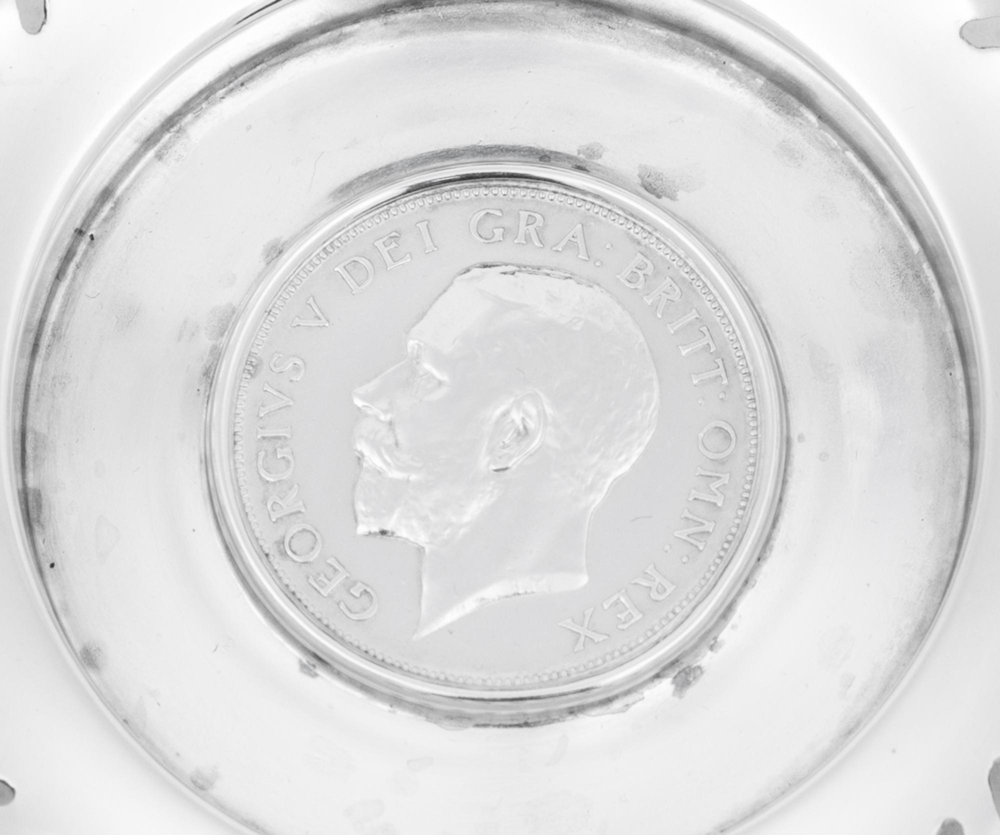 A Set of Four English Silver Coin-Inset Nut Dishes