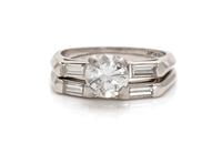 A Platinum and Diamond Ring Set,