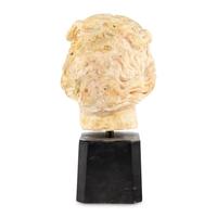 A Continental Carved Marble Head of a Woman