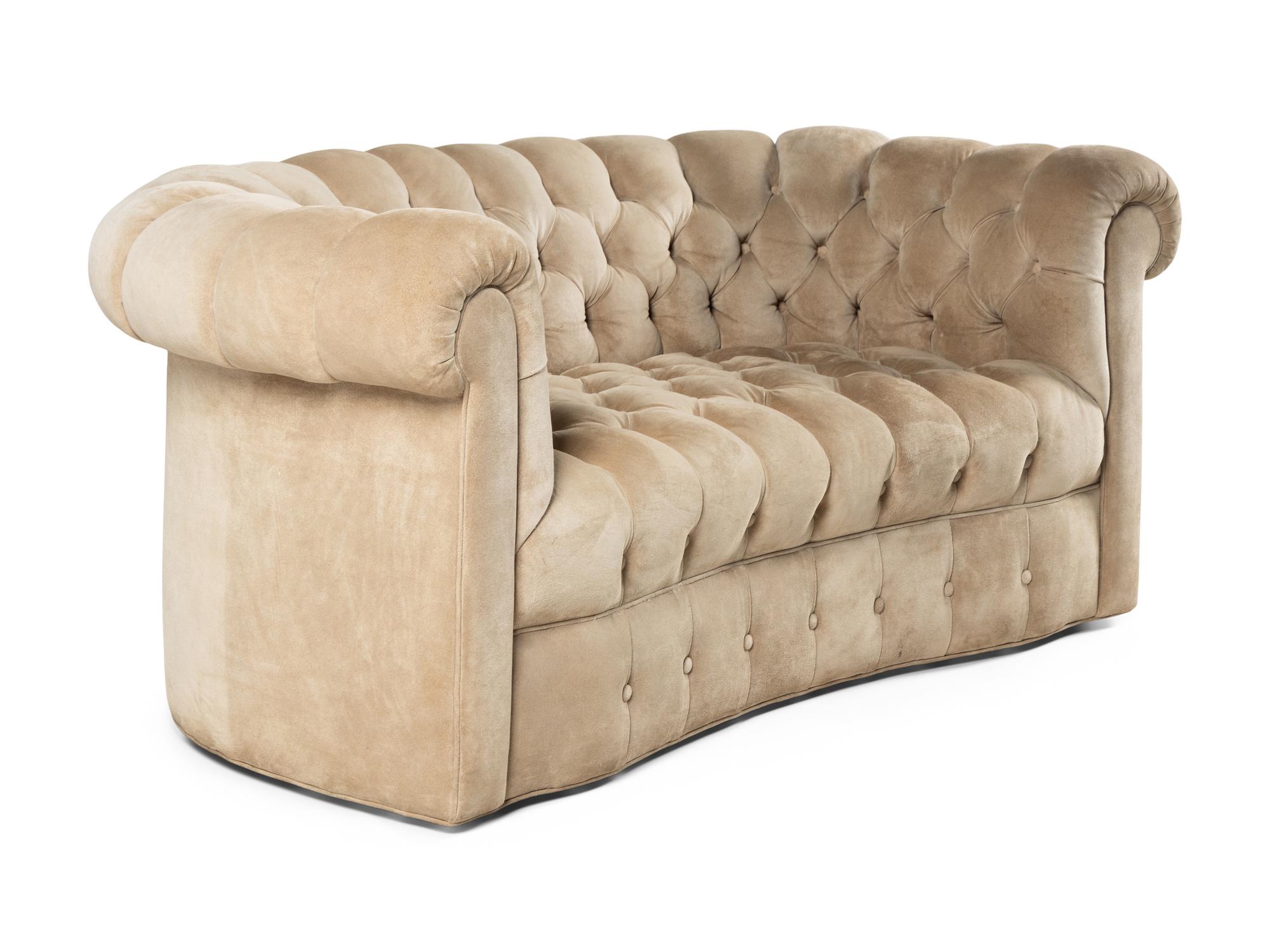 A Contemporary Suede-Upholstered Button-Tufted Chesterfield Sofa