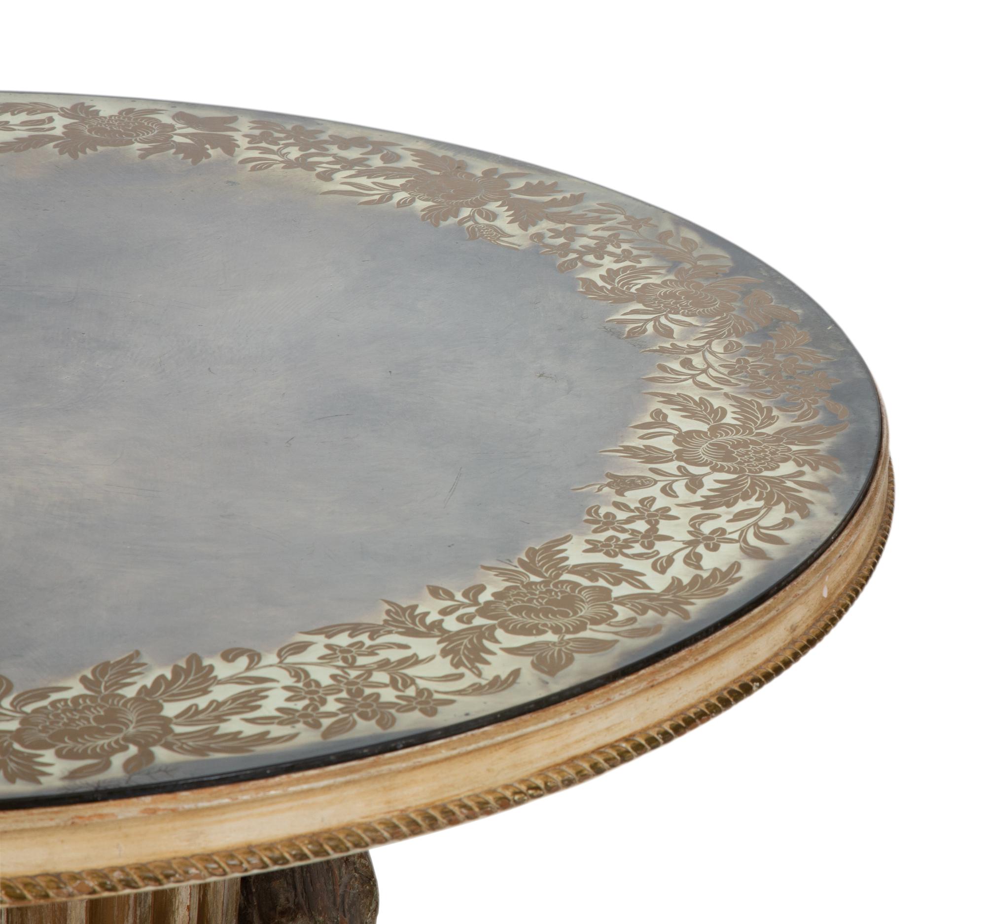 A Neoclassical Style Carved Wood Columnar Base Table with Gilt Decorated Smoke Glass Top