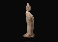An impressive Chinese painted pottery model of a standing Court Lady, Tang dynasty 彩繪仕女 唐
