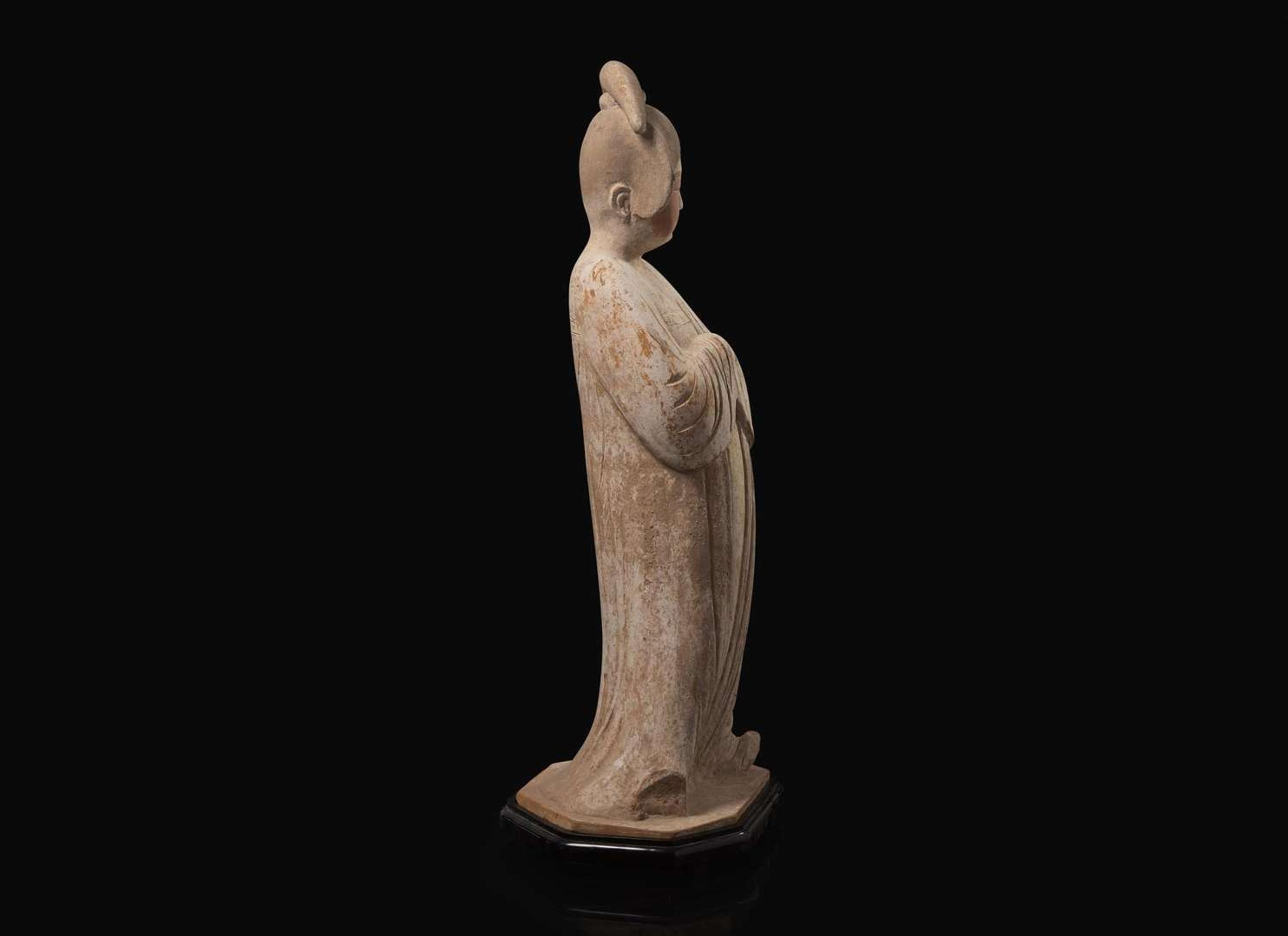 An impressive Chinese painted pottery model of a standing Court Lady, Tang dynasty 彩繪仕女 唐