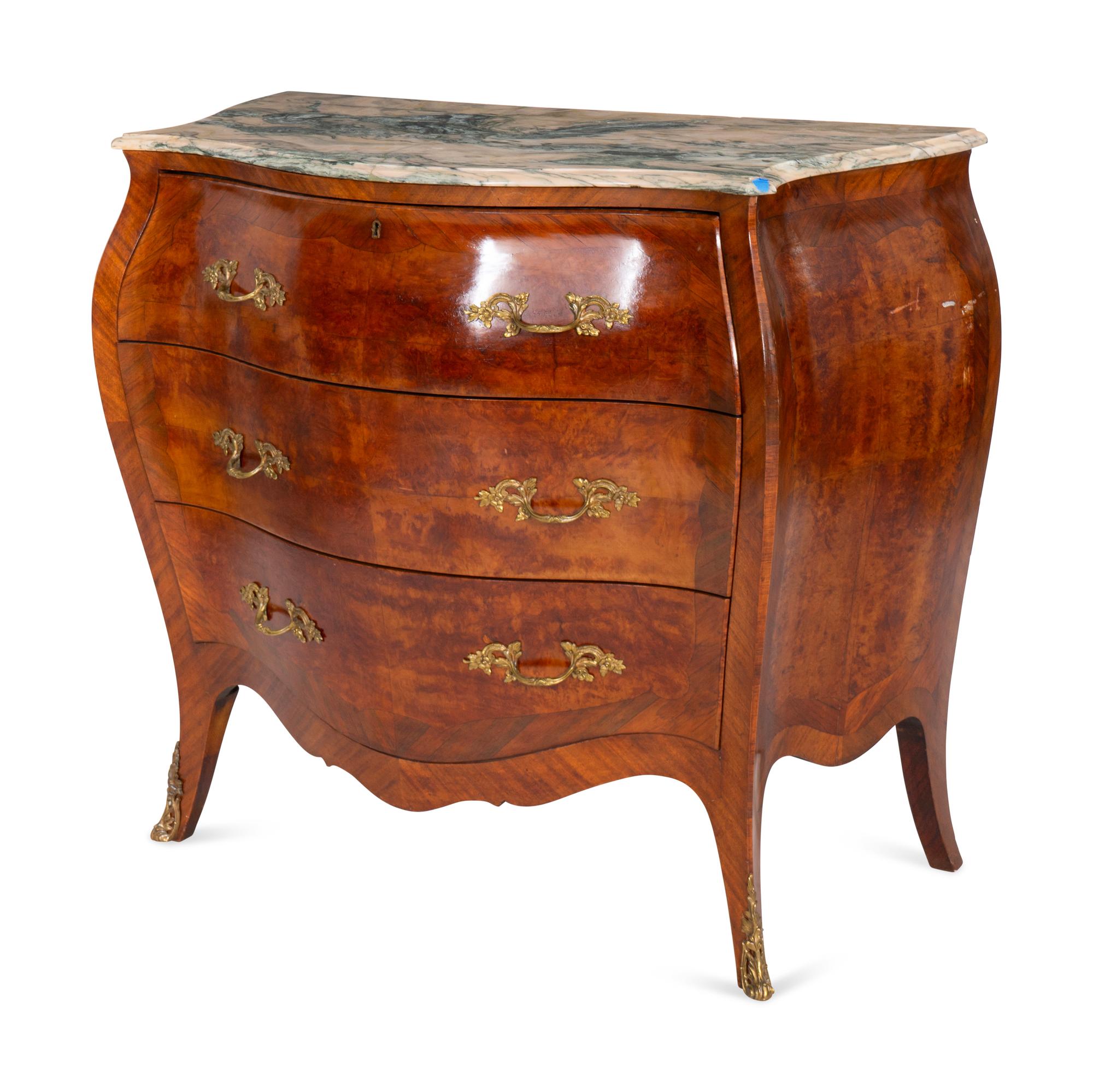 An Italian Bombe-Form Burled Walnut Three-Piece Bedroom Suite with Marble Tops