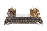 A Giuseppe Vasari Gilt and Silvered Bronze Medieval Chess Set