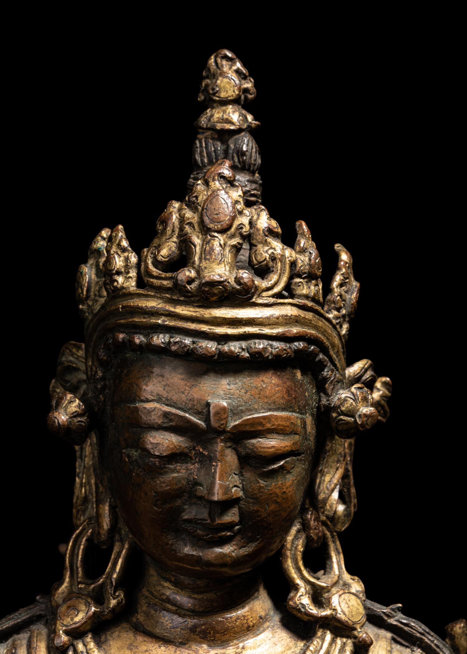 A Tibetan Gilt Bronze Seated Figure of Maitreya