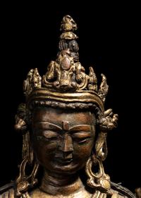 A Tibetan Gilt Bronze Seated Figure of Maitreya