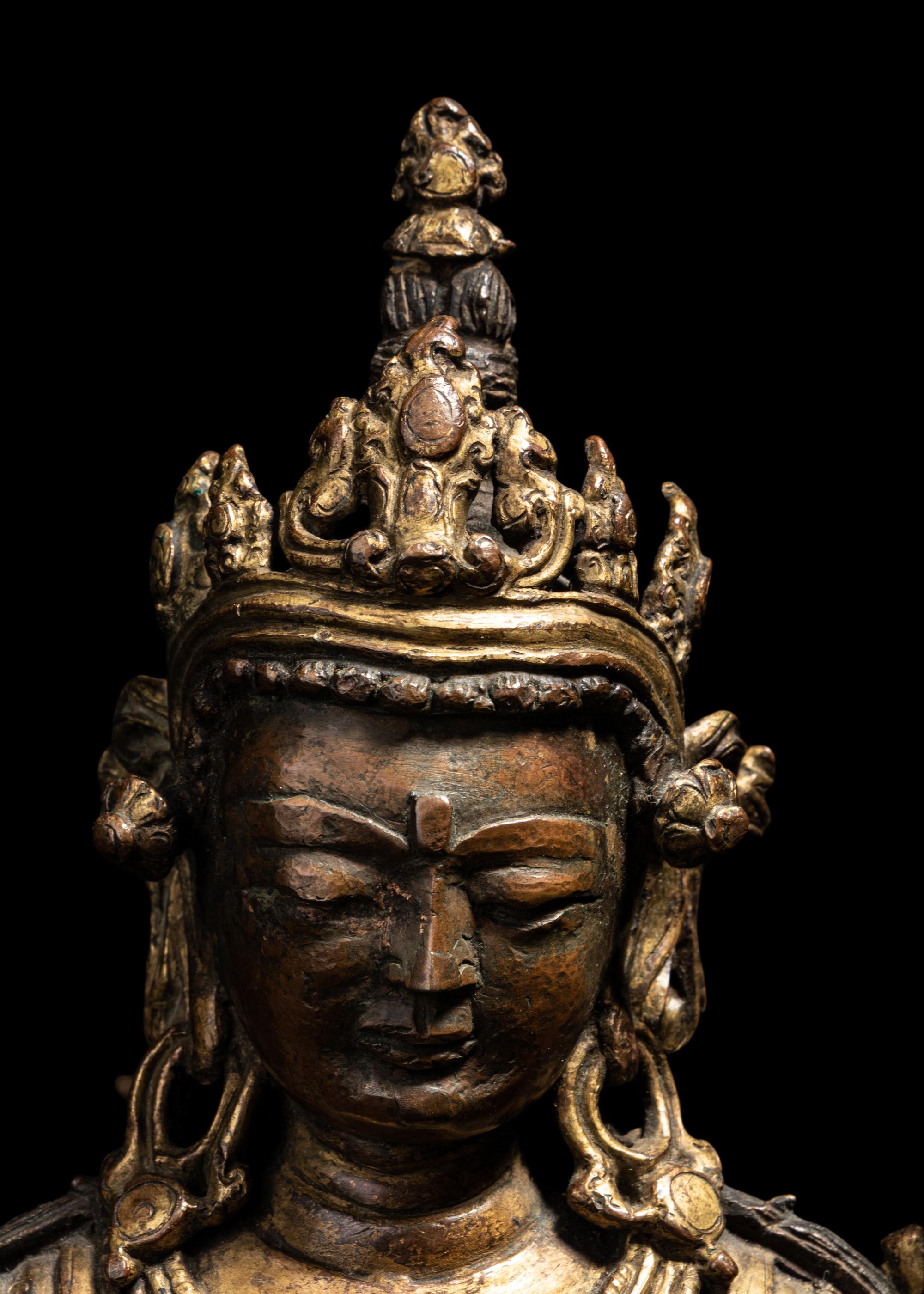 A Tibetan Gilt Bronze Seated Figure of Maitreya