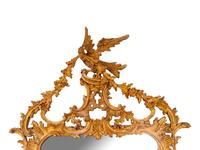 A George II Style Carved and Distressed Gilt Wood Mirror — 19TH CENTURY