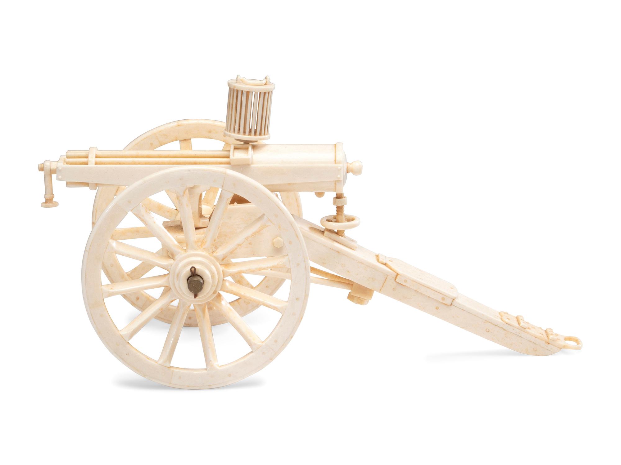 A Carved Walrus Ivory and Bone Gatling Gun Model