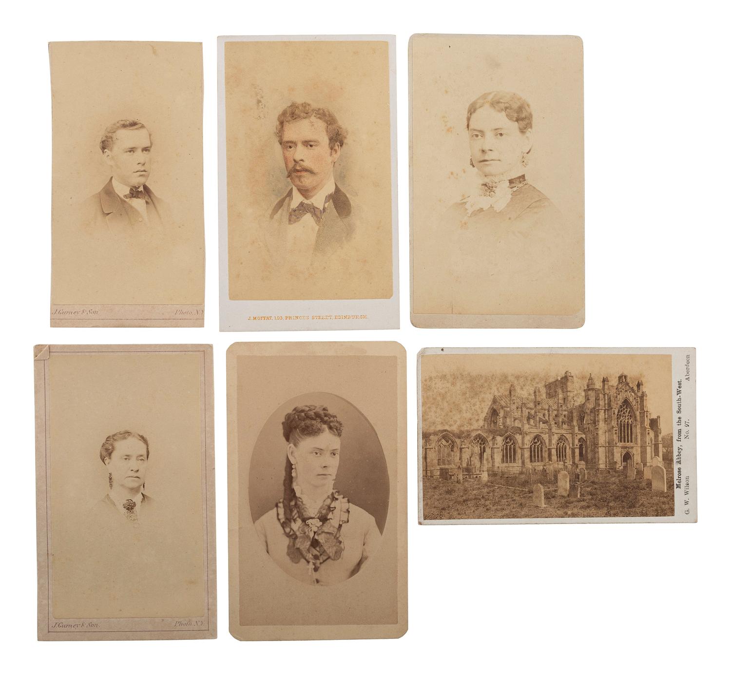[EARLY PHOTOGRAPHY]. Quarter plate daguerreotype of sweet young girl with CDVs of men, women, and children from Woodstock Plantation. Baton Rouge, Louisiana.