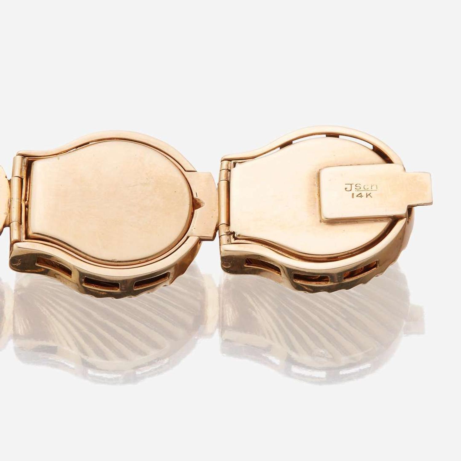 A fourteen karat gold and diamond bracelet watch, J. Schulz