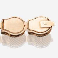 A fourteen karat gold and diamond bracelet watch, J. Schulz
