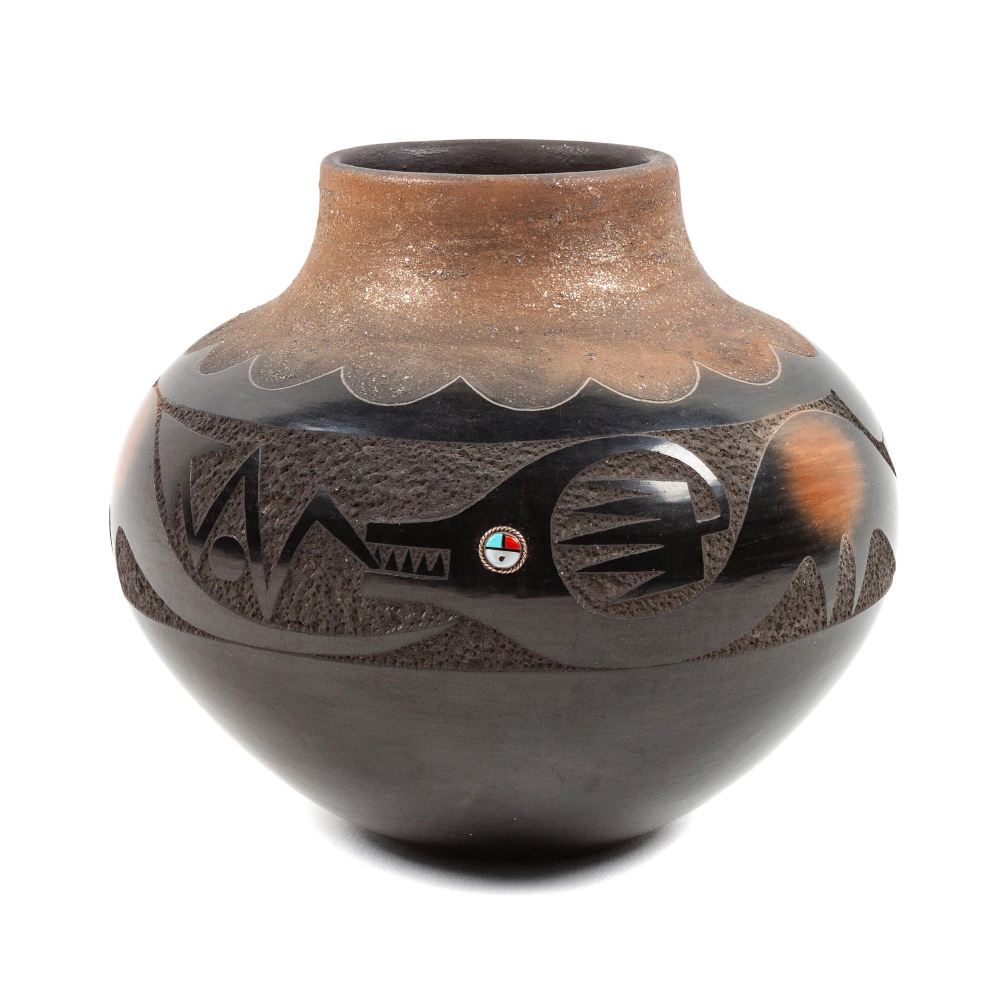 Micaceous Black and Sienna Jar, with Avanyu , 1981 Lot is located and will ship from Denver, Colorado.